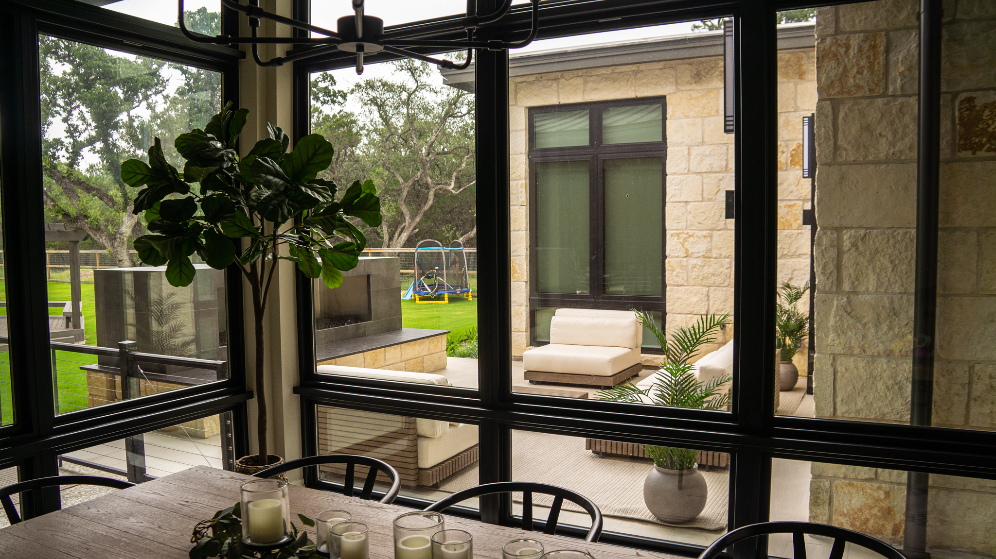 View of the fireplace and seating area from inside the home